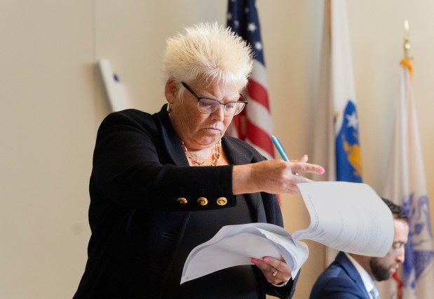 Attorney Rosemary Scapicchio looks through documents during the dangerousness hearing for her client Patrick Mendoza in Boston Municipal Court Wednesday.(Libby O'Neill/Boston Herald) July 26 2023