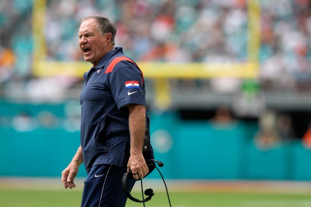 New England Patriots head coach Bill Belichick shouts during the first half of an NFL football game against the Miami Dolphins, Sunday, Oct. 29, 2023, in Miami Gardens, Fla. (AP Photo/Lynne Sladky)