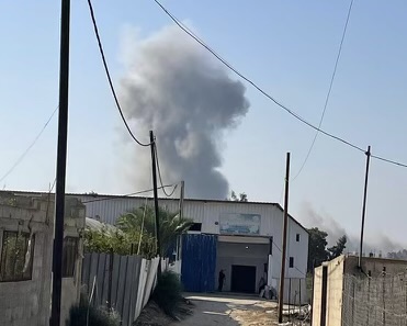 Smoke billows after an airstrike in a picture provided by a lawyer representing a Medway family stuck in Gaza. The airstrike, the lawyer said, hit Wednesday roughly 900 feet from where the family is sheltering.