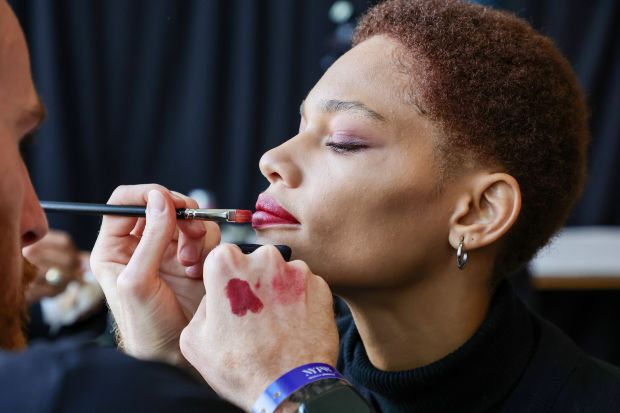 NEW YORK, NEW YORK - FEBRUARY 13: A model prepares backstage for the Bibhu Mohapatra show during New York Fashion Week: The Shows at Gallery at Spring Studios on February 13, 2023 in New York City. (Photo by Jamie McCarthy/Getty Images for NYFW: The Shows)