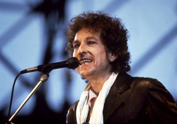 Singe Bob Dylan performs.