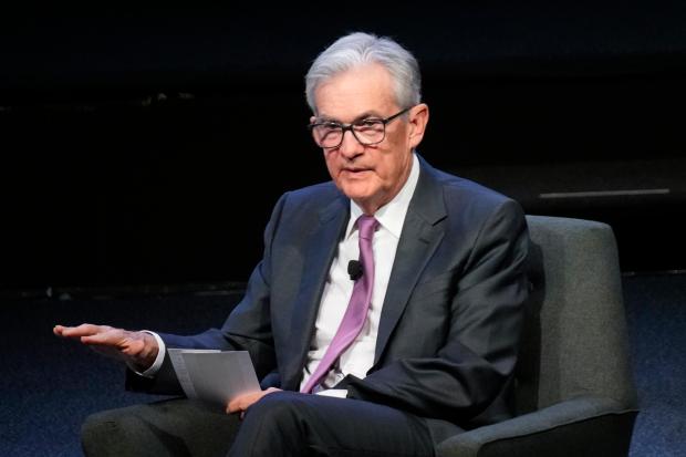 FILE – Federal Reserve Chairman Jerome Powell speaks at a...