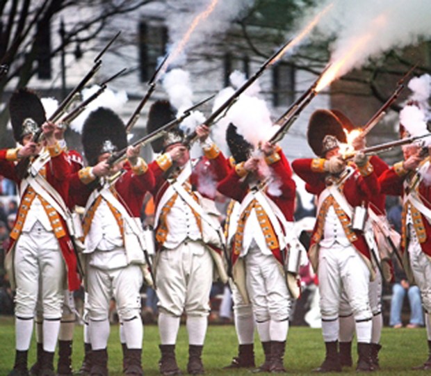 Men dressed as British Redcoats participate in the annual Battle of Lexington Re-Enactment.