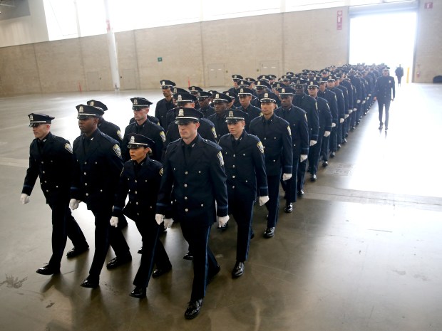Boston, MA - October 27: Boston Police graduates march into their graduation ceremony at the BCEC. (Matt Stone/Boston Herald)